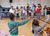 Group lessons with children who play string instruments.
