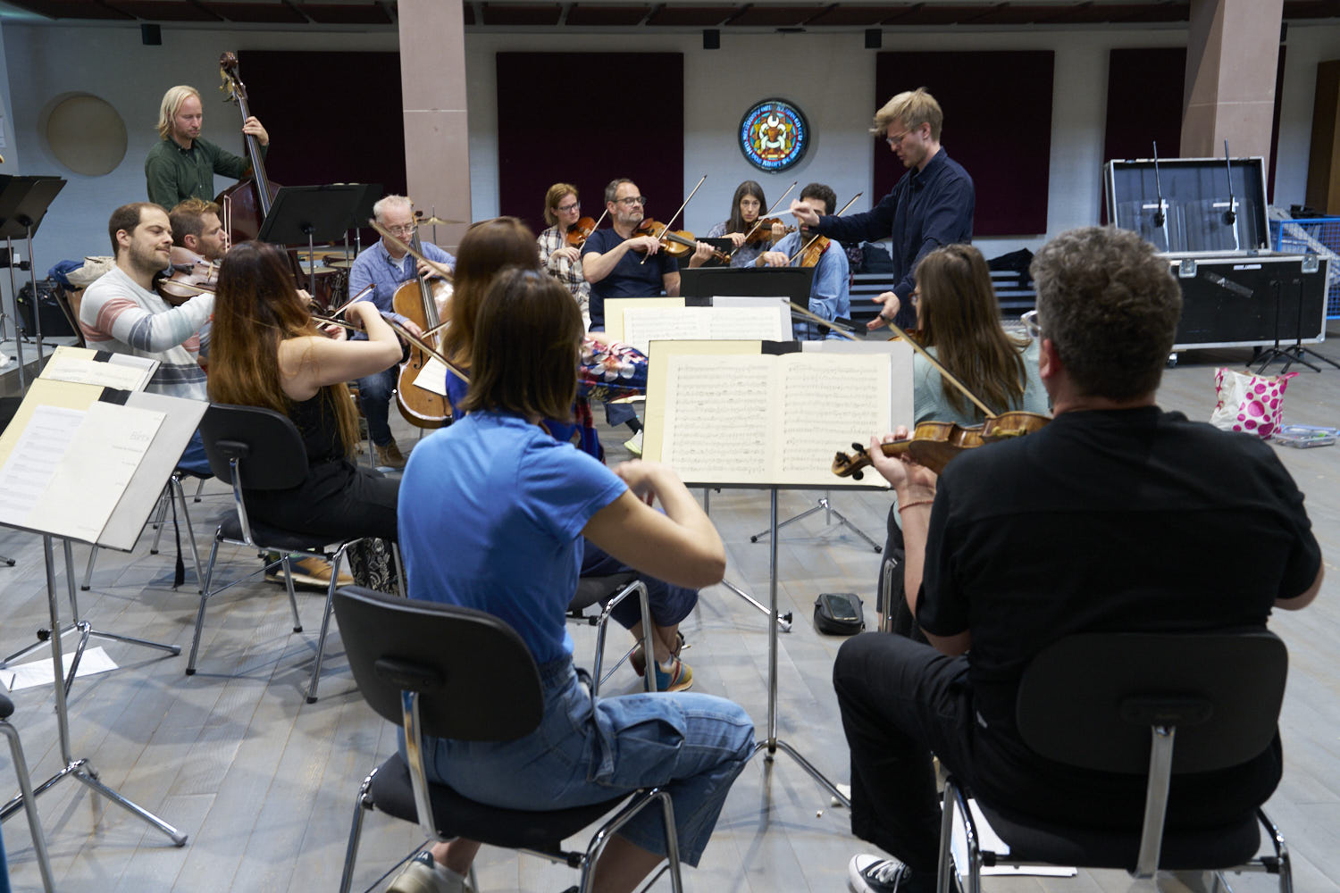 Orchester bei der Probenarbeit.